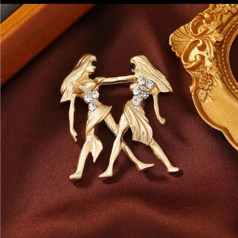 ZODIAC BROOCHES‎